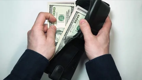 Man hands open an wallet closeup wallets with money financial crisis Stock Footage 295349149