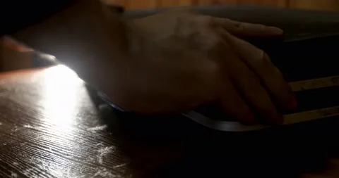 Man hands opened a vintage suitcase. Stock Footage 143966639