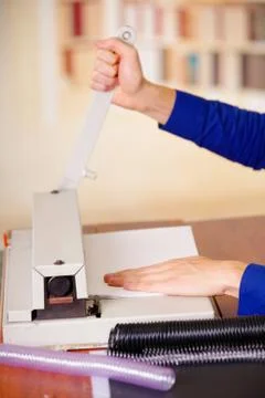Man hands over a binder using for binding documents with plastic ring binder Stock Photos