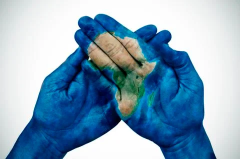 Man hands patterned with a map of Africa (furnished by NASA) Foto stock