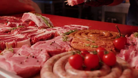 Man hands placing barbeque preps of square raw meat on skewers. Stock Footage 295267426