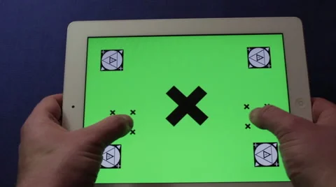 Man hands play with tablet green screen Stock Footage 56669627
