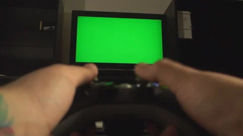 Man Hands Playing With A Console Controller Focus On TV Point Of View Video stock 35770033
