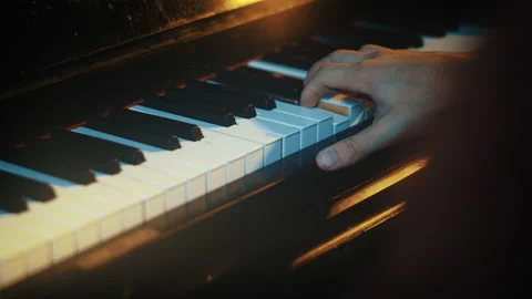 Man hands playing on an old piano Stock Footage 135386355