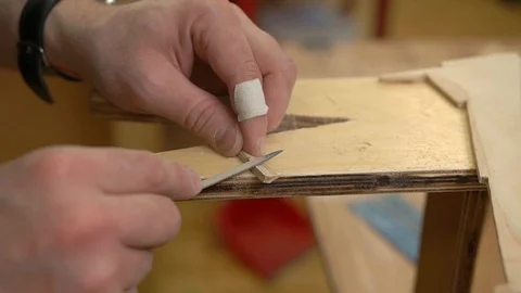 Man hands polish small brown outdated airplane detail Stock Footage 127112818
