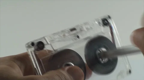 Man Hands Rewinding Audio Tape With A Pen, Cassette, Retro, Audio Media  Stock Footage 39657679
