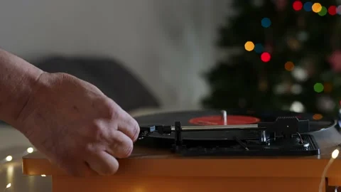 Man hands starting up doc in the background. The Christmas tree in the Stock Footage 164178738