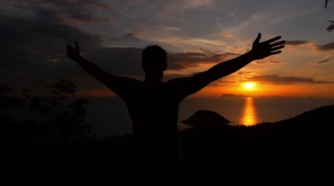 Man with Hands up at Sunset. Slow Motion. Video stock 41880498