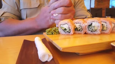 The man  the hands of sushi Stock-Footage 81037985