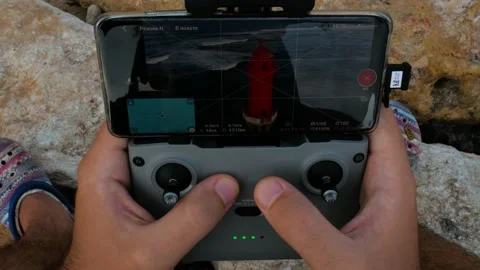 Man hands take rc drone controller and cotrol it Stock Footage 156295683