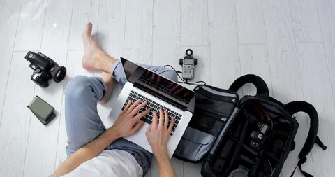  Man hands texting with client online. Hipster photographer  working from home Stock Footage 127703327