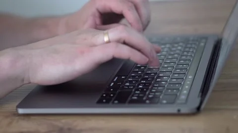 Man hands type on laptop keyboard  close up 4k Stock Footage 156588658