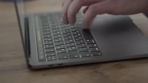 Man hands type on laptop keyboard  close up 4k Stock Footage 156588660
