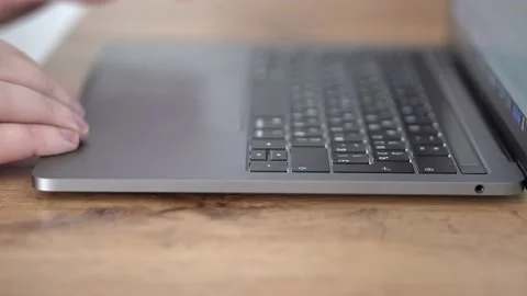 Man hands type on laptop keyboard  close up 4k Stock Footage 156588676