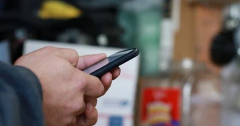 Man hands typing on cell phone. Stock Footage