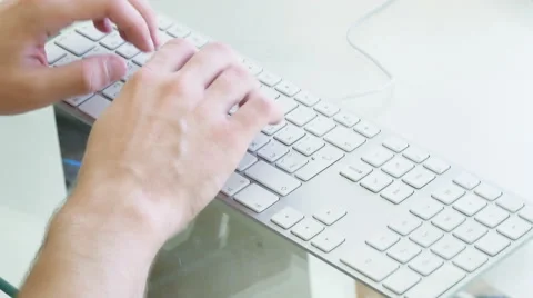 Man hands typing on a computer keyboard 4k Stock Footage 41828703