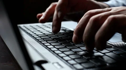 Man hands typing on a computer keyboard Stock Footage