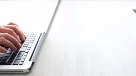Man hands typing on a computer keyboard. Slider shot Stock Footage 85653811