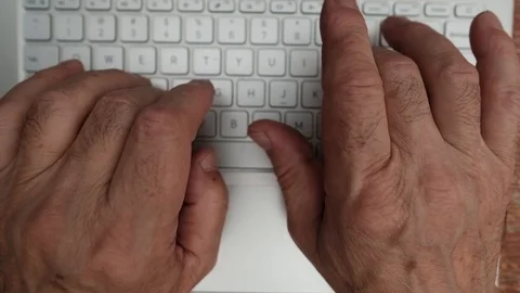Man hands typing on a computer keyboard Stock Footage 94215705