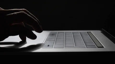 Man Hands Typing On Keyboard Of Modern Laptop On Wooden Table. Stock Footage 95776333