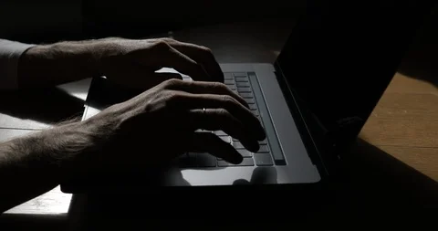 Man Hands Typing On Keyboard Of Modern Laptop On Wooden Table. Stock Footage 95776481