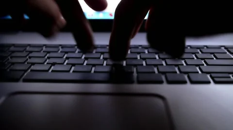 Man Hands Typing on Laptop Keyboard against Blue Screen. Stock Footage 44191130