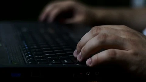 Man hands typing on a laptop keyboard Stock Footage 75205140