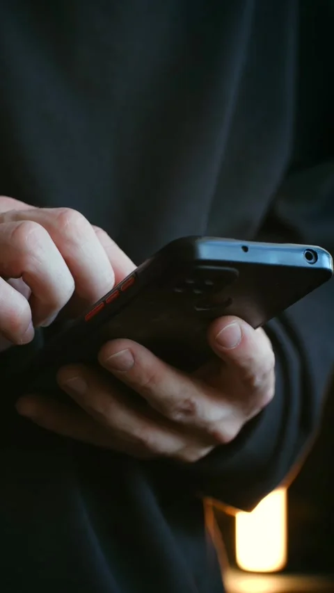 Man hands typing message on smartphone screen Stock Footage 337893225