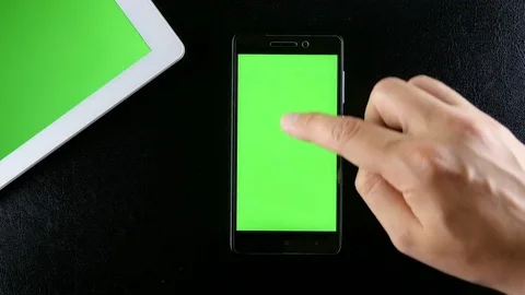 Man hands typing on smartphone green screen Stock Footage 76876887