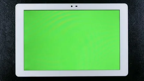 Man hands typing on tablet green screen Stock Footage 76875111