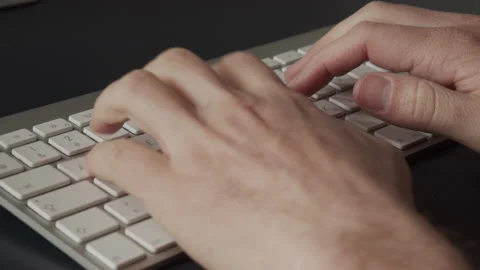 Man Hands typing at wireless Keyboard Video stock 195293105