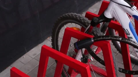 Man Hands Unlocked Bicycle Lock on Parking Video stock 63601257