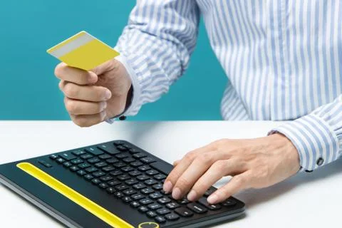 Man hands using keyboard and holding credit card with social media as Onlin.. Stock Photos