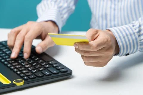 Man hands using keyboard and holding credit card with social media as Onlin.. Stock Photos