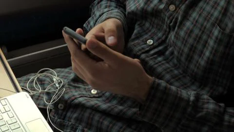 Man hands using mobile phone. Stock Photos