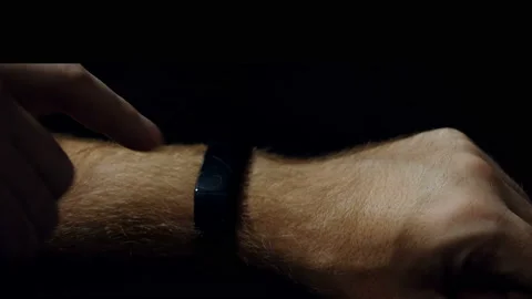 Man hands using smart watch with future media hologram. HUD Stock Footage 95391652