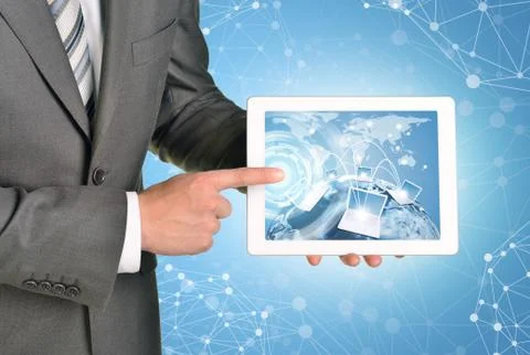 Man hands using tablet pc. Image of Earth and laptops on screen Illustrazione stock