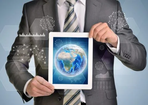 Man hands using tablet pc. Image of Earth and network on screen Illustrazione stock