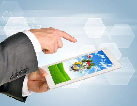 Man hands using tablet pc. Image of Earth and house on screen Illustrazione stock