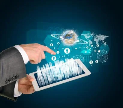 Man hands using tablet pc. Business city on touch screen. Earth with business 스톡 사진