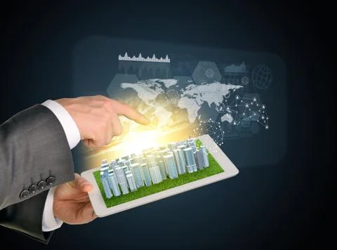 Man hands using tablet pc. Business city on touch screen. Virtual elements ne Stock Photos