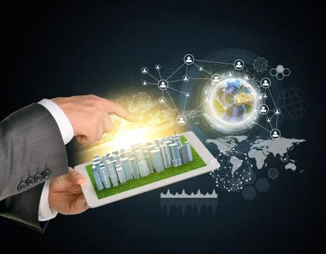 Man hands using tablet pc. Business city on touch screen. Earth with network nea Stock Photos
