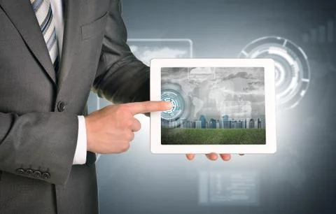 Man hands using tablet. Virtual elements and city on touchscreen Stock Photos