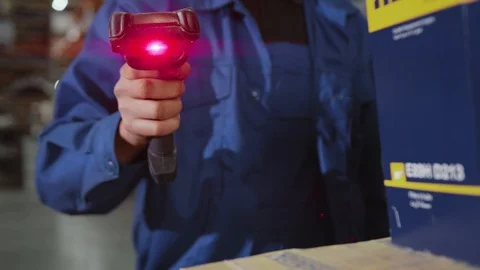 Man hands worker hold scanner for products red light cardboard commercial Stock Footage 116997101
