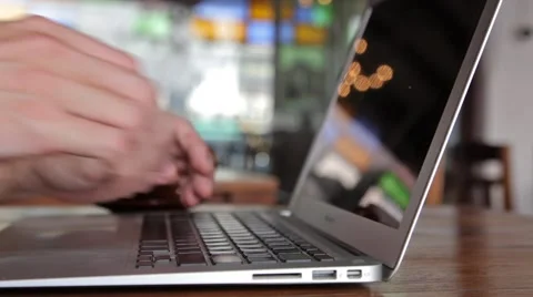 Man hands working on laptop computer in cafe Stock Footage 49716251