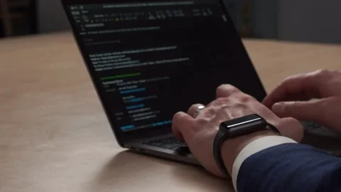 Man hands working on laptop, smartwatch wearing Stock Footage 147027296