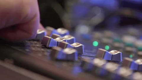 Man hands working on sound device tuning speaker voice via sliders Close Up Stock Footage 172199601