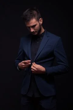 Man handsome buttoning jacket suit Foto stock