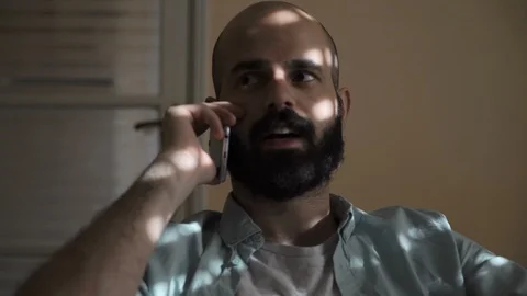 Man Hanging Up the Phone Video stock 85604616