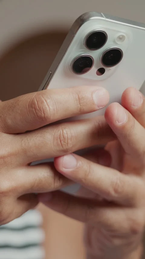 Man Happily Using Smartphone At Home Stock Footage 334625327